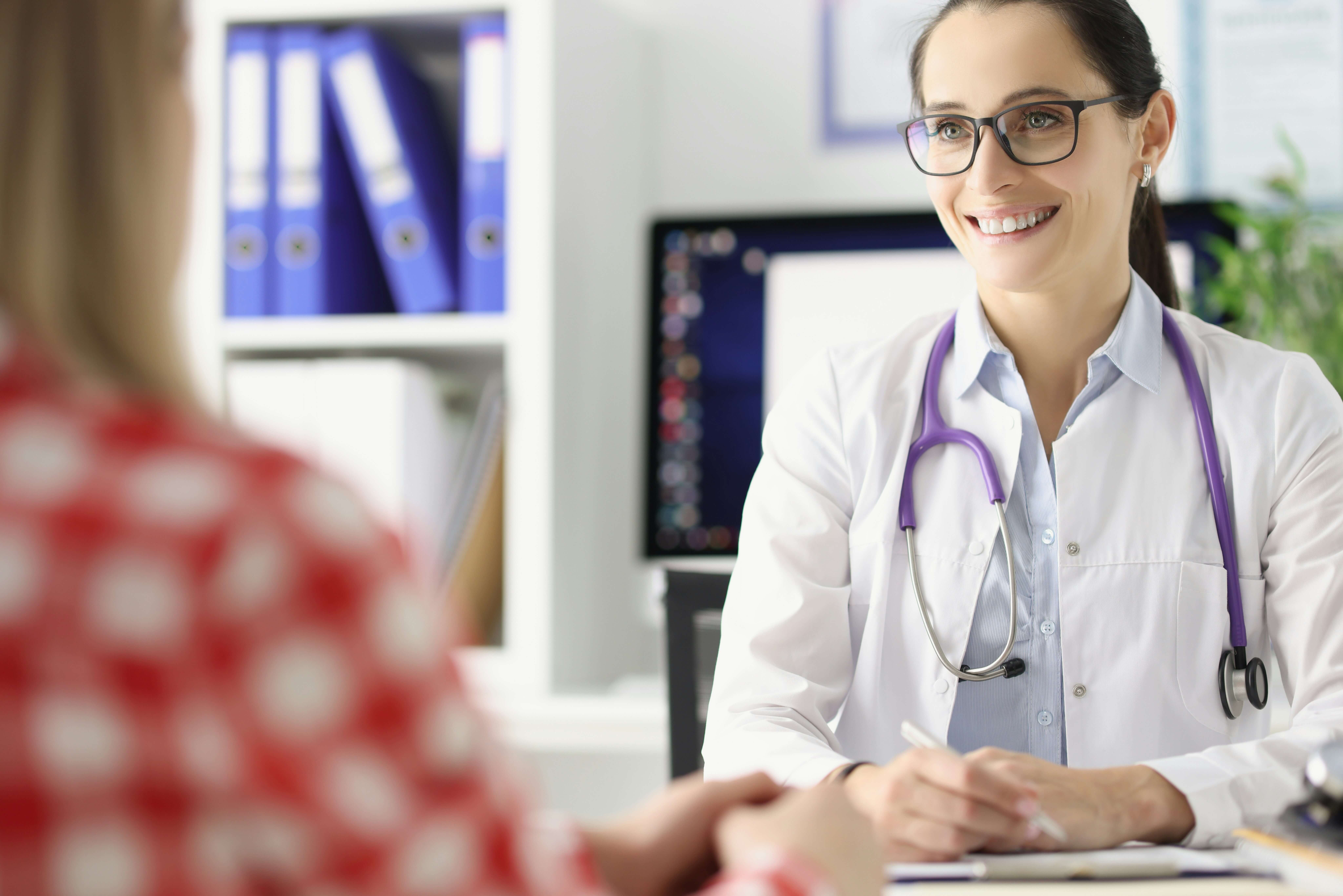 Doctor consulting patient