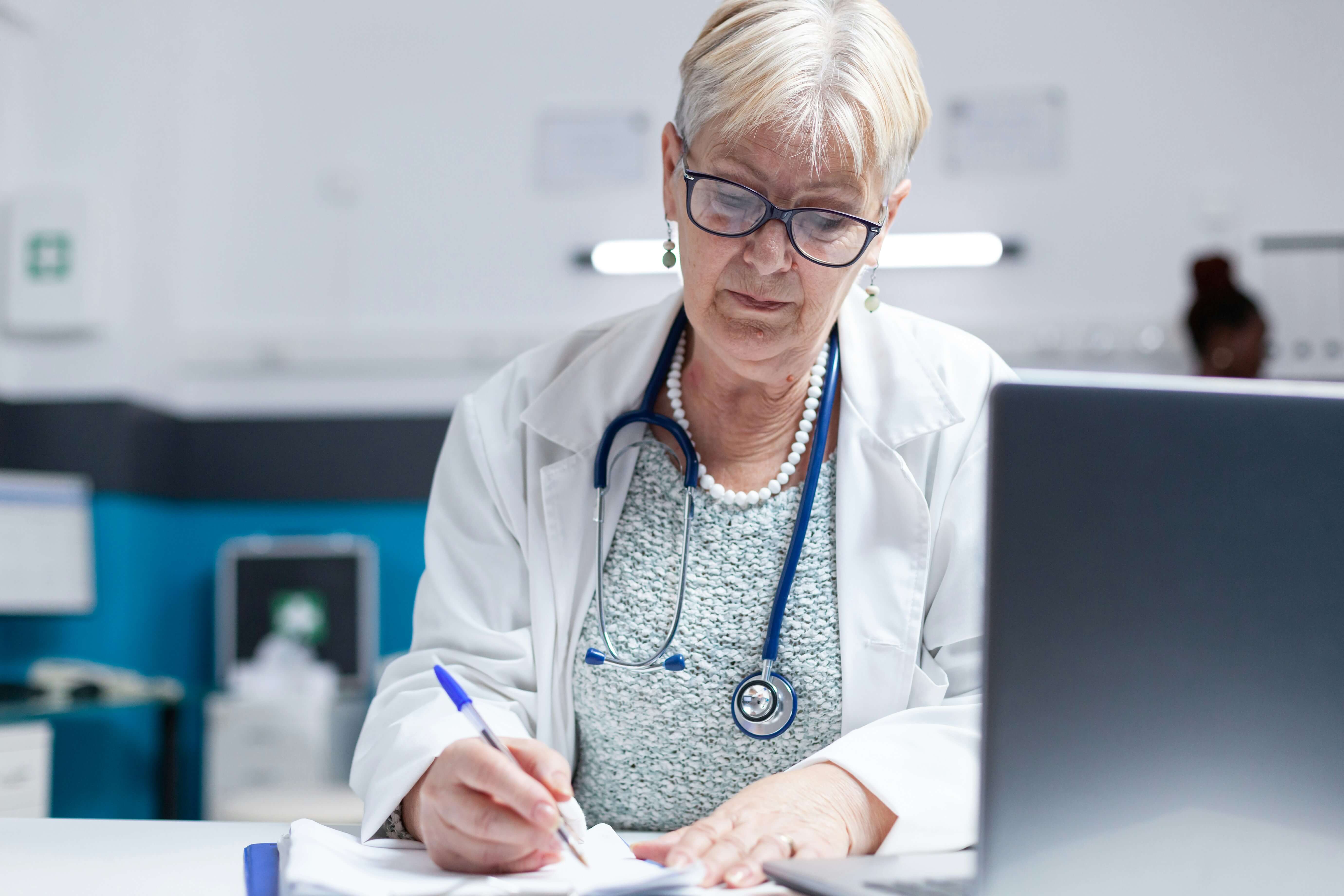 Doctor working on paperwork